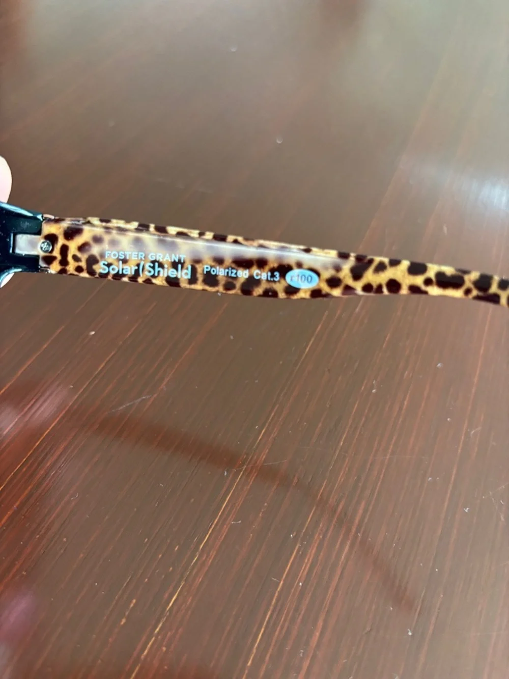 Foster Grant Solar Shield polarized,tortoise shell leopard arms,black frame/lens
